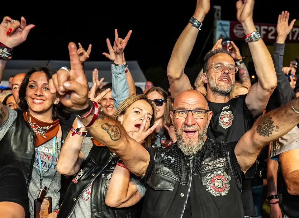 home-panel-tickets Riders from more than 46 countries celebrating during a live concert at the IRF
